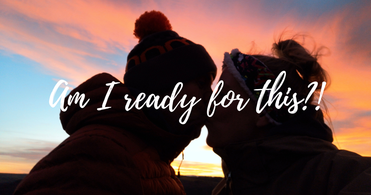 Silhouette of man and woman in profile, kissing, with colourful sunset behind them and the words "Am I ready for this?!" across the image