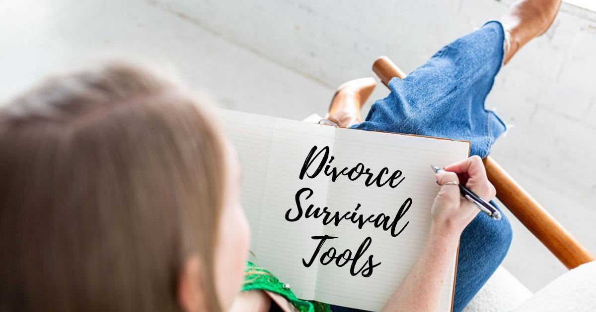Woman writing in notebook "Divorce survival tools"